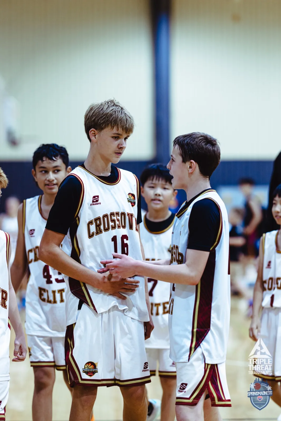Crossover Elite teammates on court